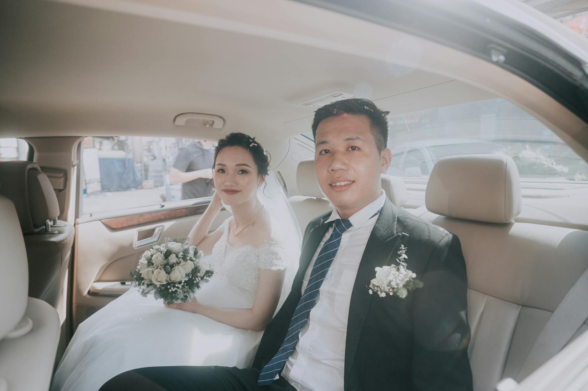 Couple in car backseat